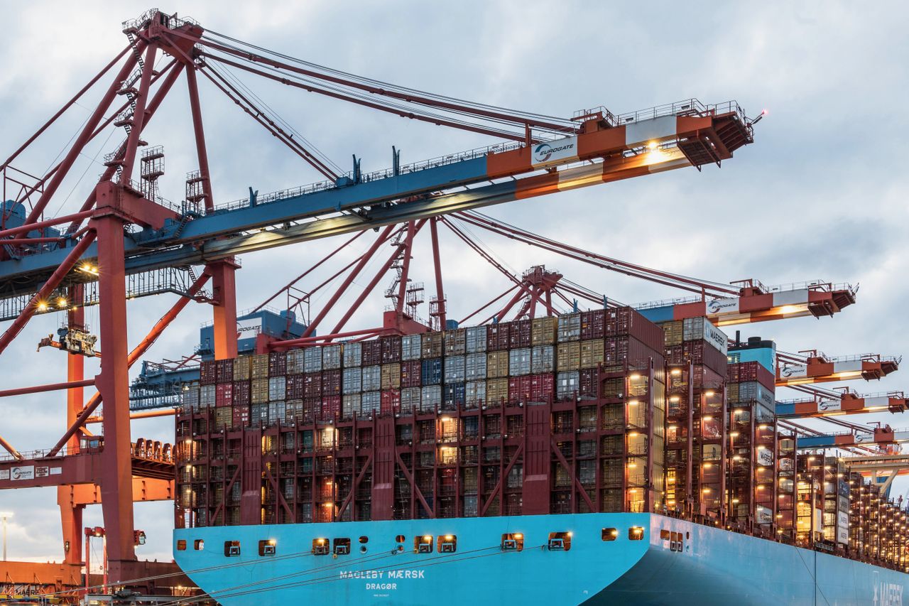 A cargo ship loaded with containers at Hamburg's bustling commercial dock.